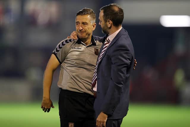 An emotional Jon Brady with Cobbers chief executive James Whiting at the final whistle (Picture: Pete Norton)