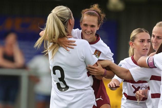Vicky Barrett celebrates with goalscorer Jade Bell after Town's second goal