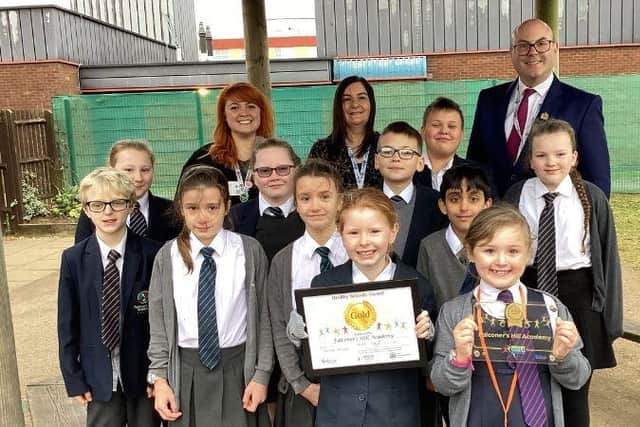 Falconer's Hill Academy receives it's award