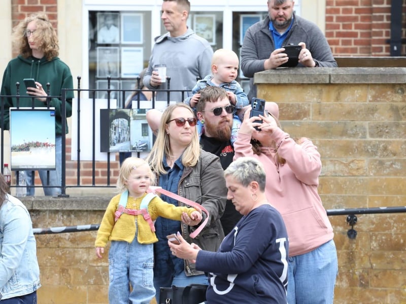 Kettering town centre: crowds line town centre to welcome The Royal Anglian Regiment for Armed Forces Day parade /National World