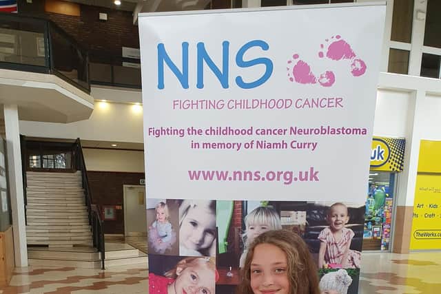 Shaniya fundraising in the Swansgate shopping centre for Niamh's Next Step