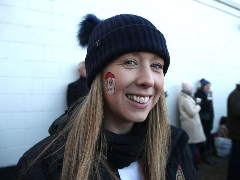 A Northampton Town fan with a painted face prior to the Sky Bet League Two match between Northampton Town and Forest Green Rovers at PTS Academy Stadium on December 14, 2019.