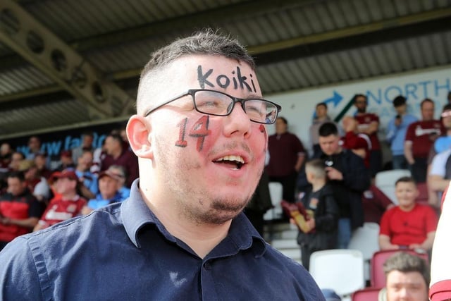 A Northampton Town fans looks on during the Sky Bet League Two match between Northampton Town and Exeter City at Sixfields on April 30, 2022.