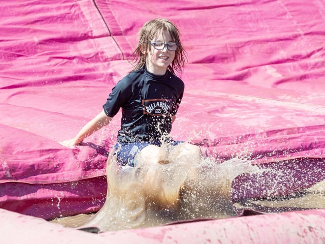 Children were all smiles on Saturday July 12 when they took part in the Race for Life, five kilometre obstacle course in Abington Park, Northampton.