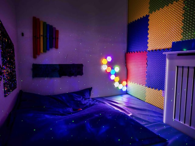 There is a new sensory room, car wash role play zone, two large ball pits with ball showers, and a sports court with astroturf on the top level.