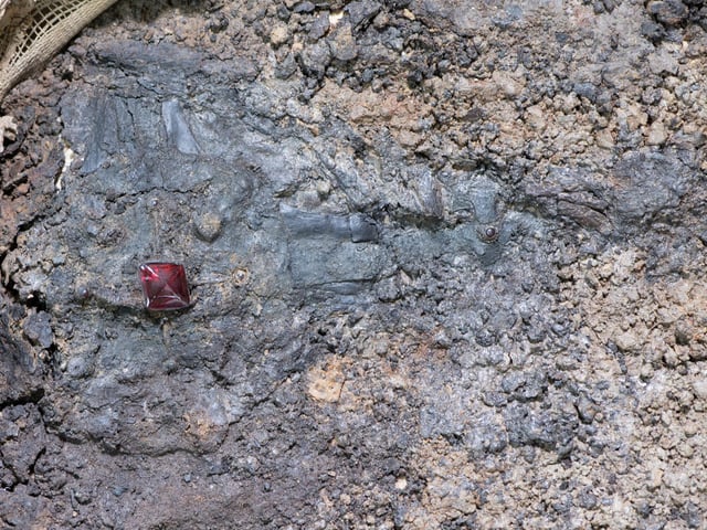 Partially micro-excavated cross from Harpole Burial