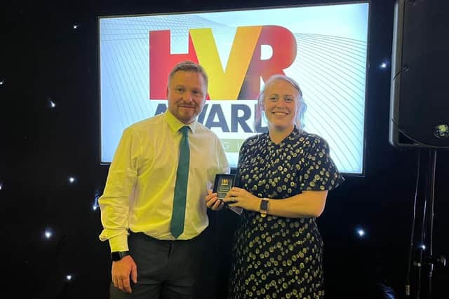 Carley Fountain and Karl Fountain co-owners of Castle Climate Control Ltd, accepting HVR (Heating, Ventilations & Refrigeration) Award for Highly Commended Heat Pump Installer of the Year, in 2024.