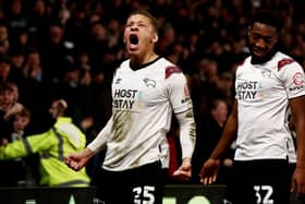 Dwight Gayle of Derby County celebrates after scoring his team's first goal during the Sky Bet League One match between Derby County and Reading at Pride Park Stadium on March 12, 2024 in Derby, England. (Photo by Naomi Baker/Getty Images)