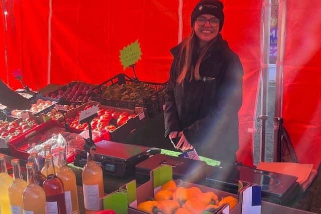 Demi at her market stall