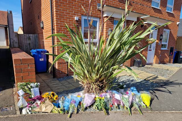 Floral tributes: Isobella 'Izzy' Knight's home in Donnington Road, Burton Latimer/National World