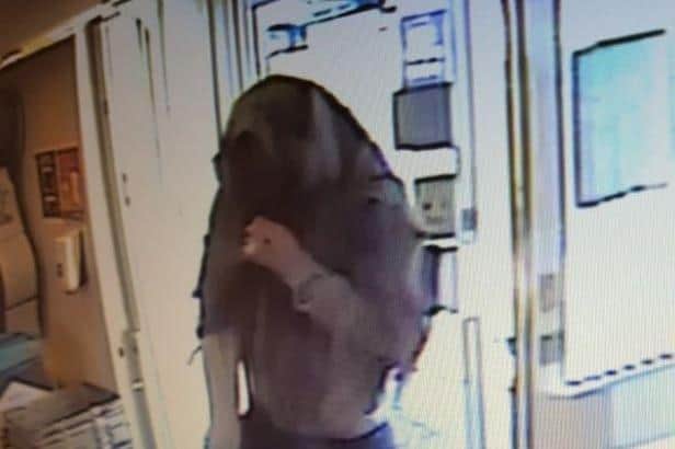CCTV footage of Woodford in the shop.