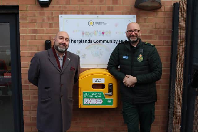 Cam Whyld, head of engagement at NPH and Ben Ryrie EMAS outside Thorplands Hub 