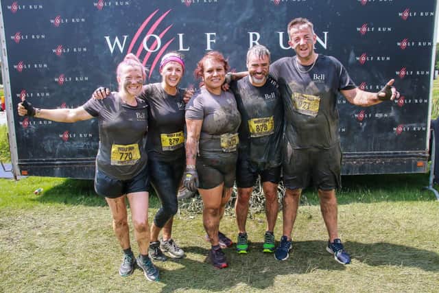 The team from Bell of Northampton celebrate their success at the Summer Wolf Run