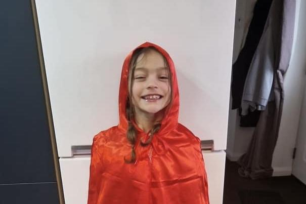 Avaiah-Mae aged 8 as Little Red Riding Hood.