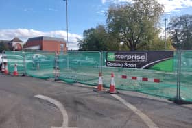 Signs saying “coming soon” have appeared at a Northampton town centre car park where Enterprise Rent-A-Car has been given permission to open a new rental vehicle site.