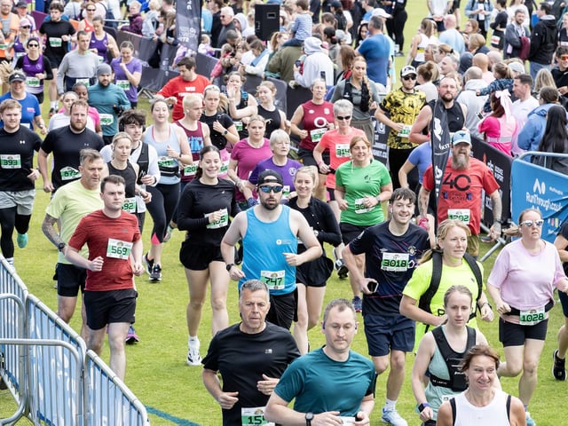 Hundreds of runners braved showers and wind to take on the race on Sunday (May 25), which started and finished at Sixfields stadium.