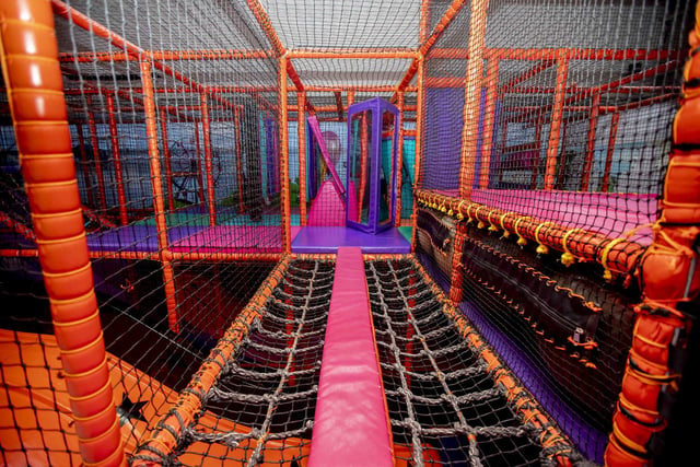 There is a new sensory room, car wash role play zone, two large ball pits with ball showers, and a sports court with astroturf on the top level.