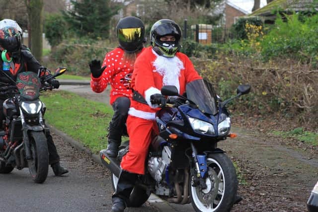 Some came dressed in Santa suits, a couple as elves and one as the Grinch to support the cause and get into the festive spirit. Photo: Andy Simons.