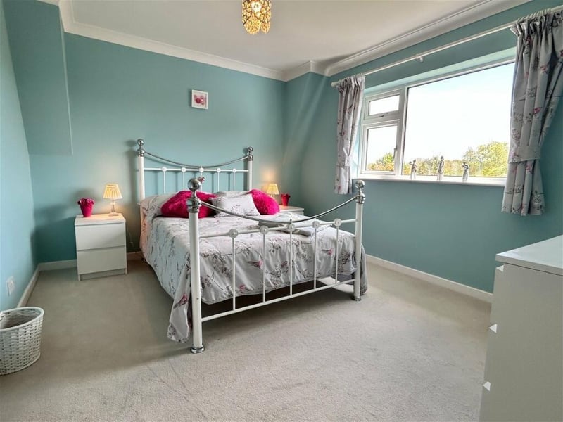One of the property's six spacious bedrooms