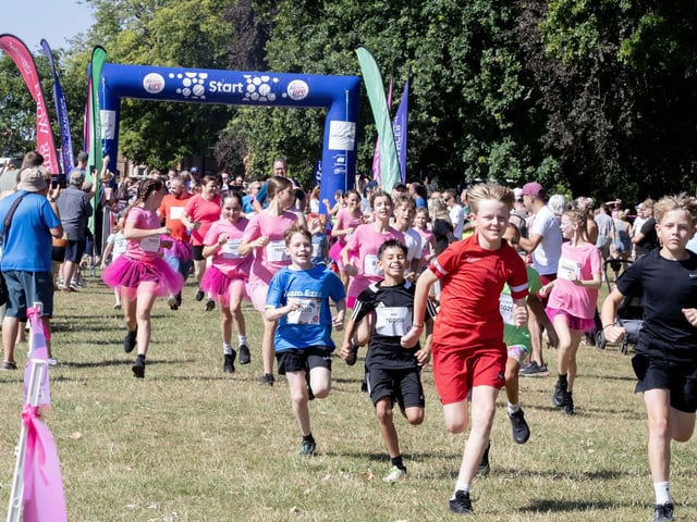 Children were all smiles on Saturday July 12 when they took part in the Race for Life, five kilometre obstacle course in Abington Park, Northampton.
