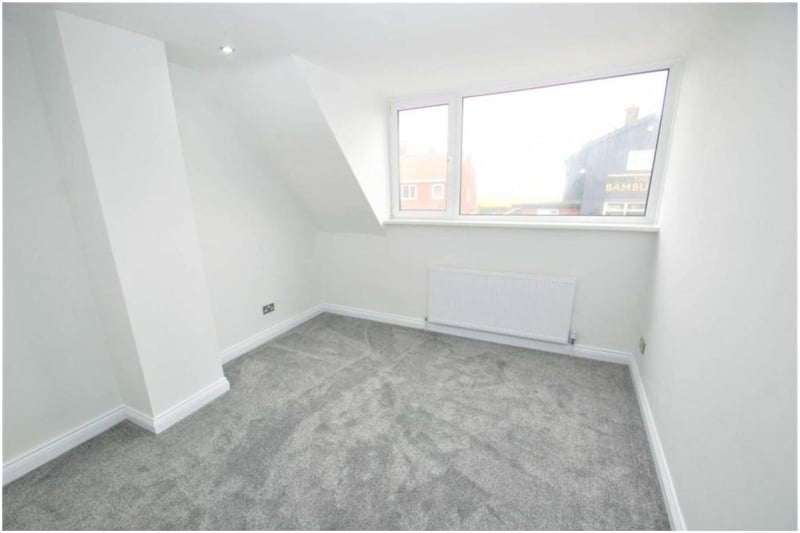One of the three bedrooms inside the home which have all been refurbished with neutral walls and carpets.