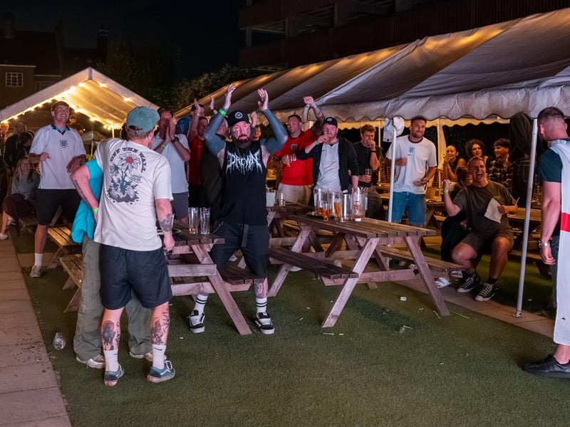 Football fans watching England vs Mexico in the garden of The Black Prince in Northampton. Photo by David Jackson.