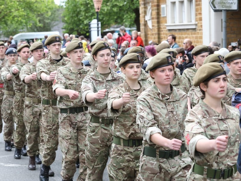 Kettering town centre: crowds line town centre to welcome The Royal Anglian Regiment for Armed Forces Day parade /National World