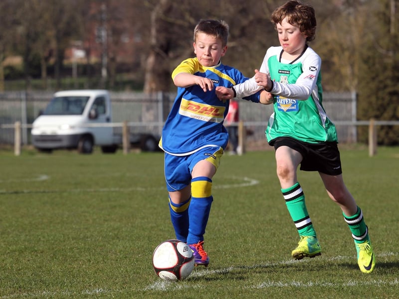 Action from NTFA All Weather Cup under 11 between Grange Park Rangers and Towcester Town at Studland Road.
