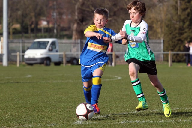 Action from NTFA All Weather Cup under 11 between Grange Park Rangers and Towcester Town at Studland Road.