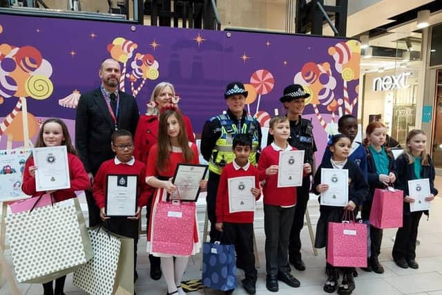 A prize-giving was held on Friday, December 8, at the Grosvenor centre which sponsored the creation of display versions of the winning and runner-up posters.