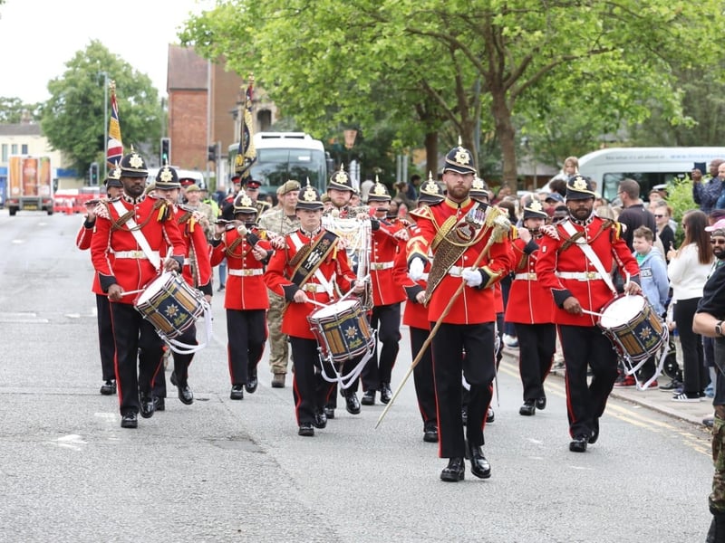 Kettering town centre: crowds line town centre to welcome The Royal Anglian Regiment for Armed Forces Day parade /National World