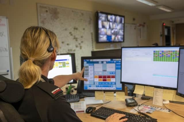 The team of 16 are split into four 'watches' gathering information to make sure fire crews get to incidents quickly and armed with the right information
