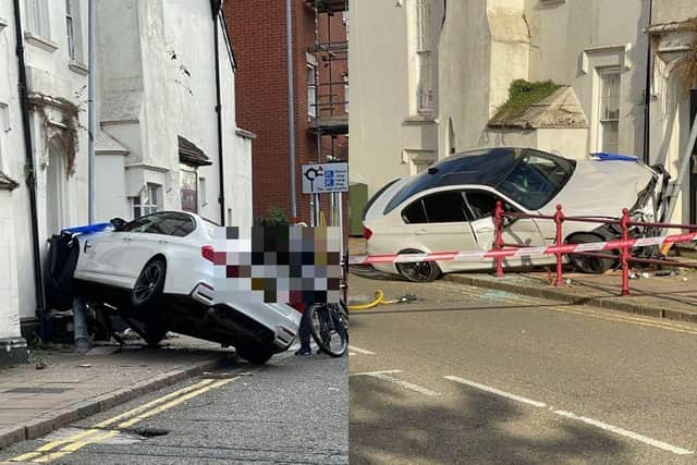 Occupants fled from the scene after a car crashed into a building in Daventry town centre.