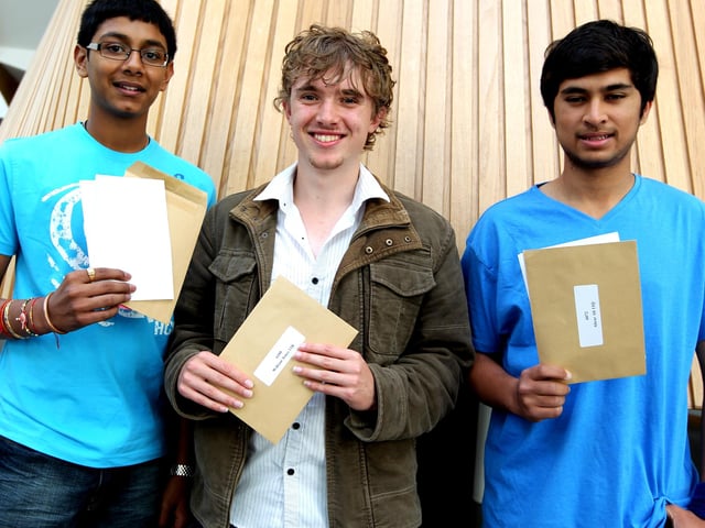 GCSE 2010 exam results day at Northampton School for Boys. Left to right are Nand Patel, William Jones and Abrar Ali
