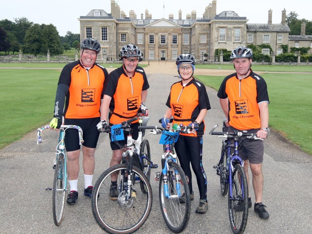 2012 - Cycle for Cynthia event takes place on the Althorp Estate with hundreds of riders taking part. Pictured are Tony George, Derek Hine, Janey Hine & Frank Platt from Team Briggs & Forrester.