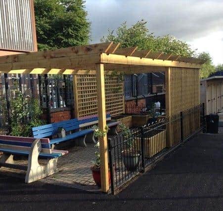 This school spent its grant on an outdoor seating area with raised beds for insect-friendly plants.