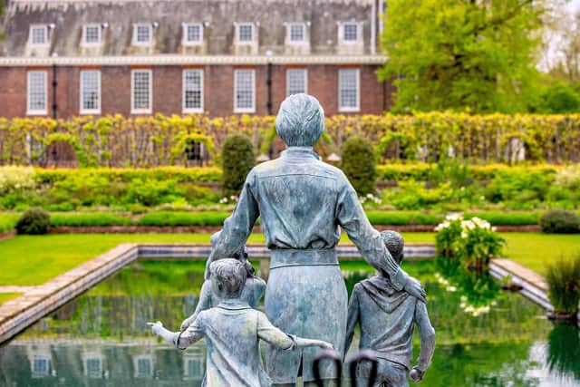 The statue of Diana Princess of Wales in the Sunken Garden of Kensington Gardens