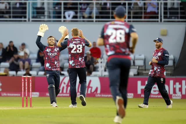David Willey celebrates with Lewis McManus after the dismissal of Dan Mousley (Picture: Peter Short)