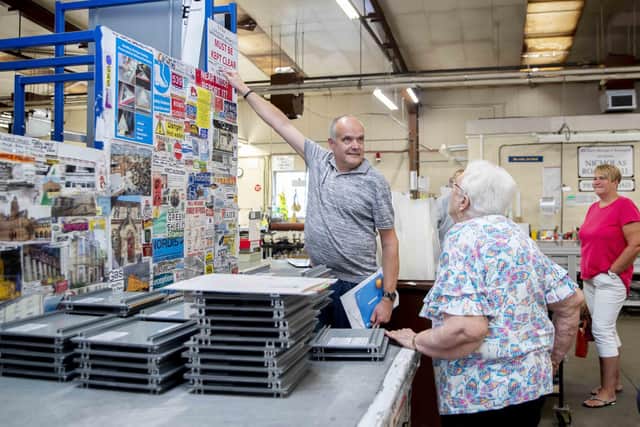 Jon Gardiner, a packer cleaner for Nordis, took the celebration as an opportunity to show off his hard work to his mother and sister.