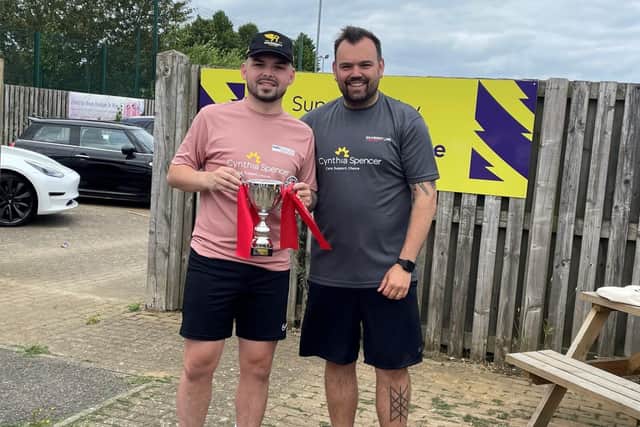 Silverstone Leasing's Ryan Bishop (right) presents the winner's trophy to Ollie Emery