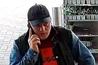 Police would like to speak to this man after theft from a Northampton shop.