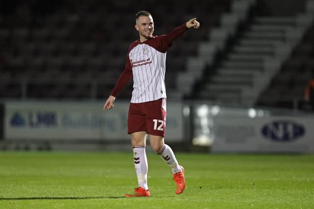 Marc Leonard is all smiles after firing the Cobblers into a 1-0 lead against Sutton United at Sixfields on Tuesday night (Picture: Pete Norton)