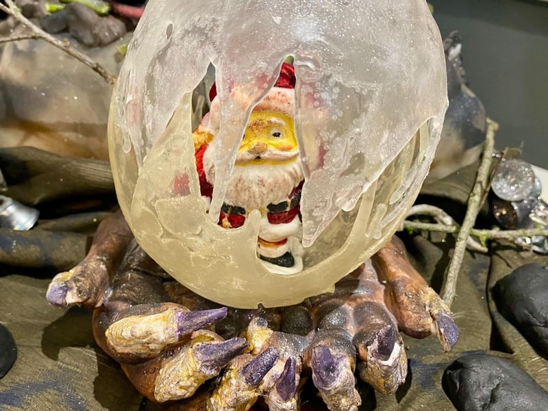 Krampus with his Santa Snow Globe