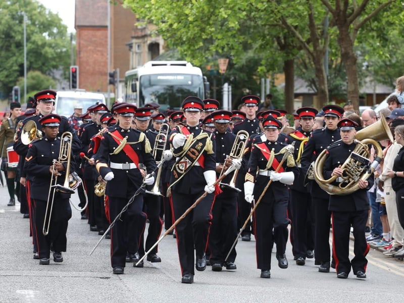 Kettering town centre: crowds line town centre to welcome The Royal Anglian Regiment for Armed Forces Day parade /National World