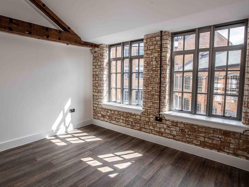 The Grade II listed former shoe factory has been converted into 89 stylish apartments by the OEH Group