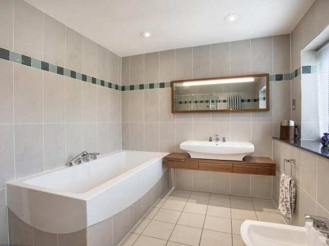 One of three bathrooms in the property