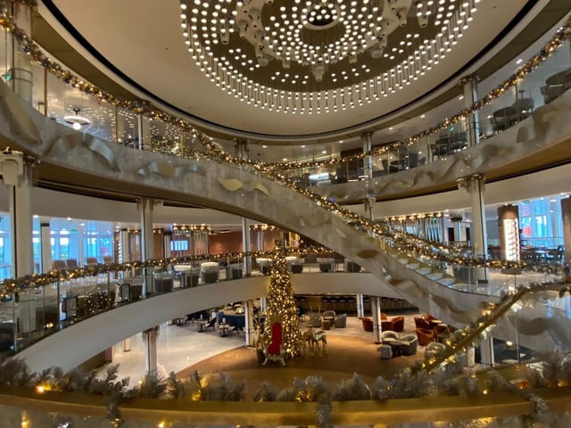 The Grand Atrium on P&O Arvia was pictured by Mary Smith, who joined 250 other passengers sleeping on floors in one of the bar areas.