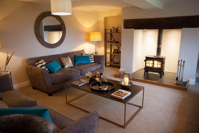 The main sitting room is cosy, comfortable and warm