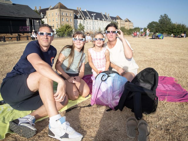 Families gathered at Upton Park on Wednesday night to watch the eclipse