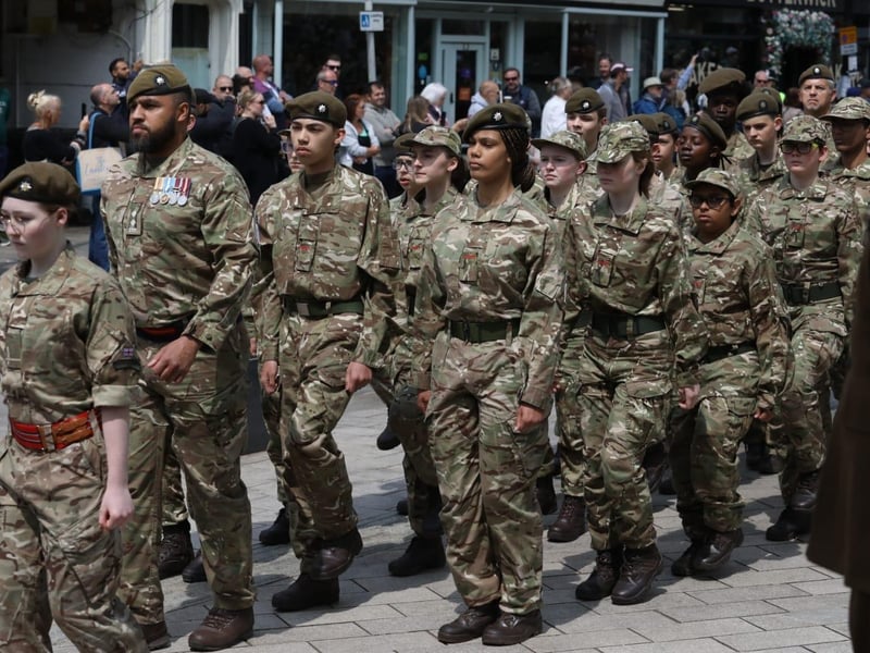 Kettering town centre: crowds line town centre to welcome The Royal Anglian Regiment for Armed Forces Day parade /National World